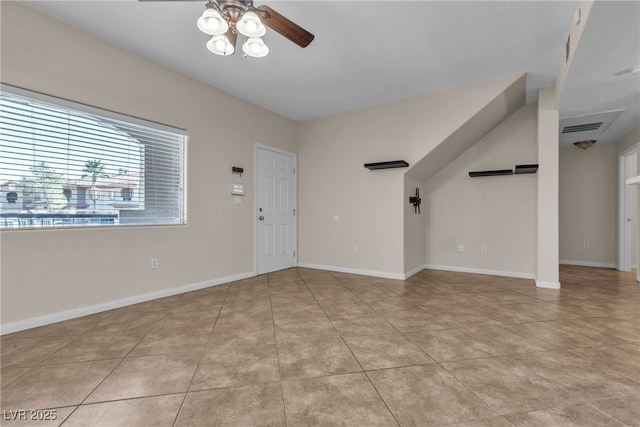 entrance foyer with ceiling fan, visible vents, baseboards, and light tile patterned flooring