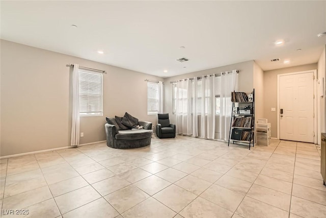 sitting room featuring recessed lighting, baseboards, visible vents, and light tile patterned flooring