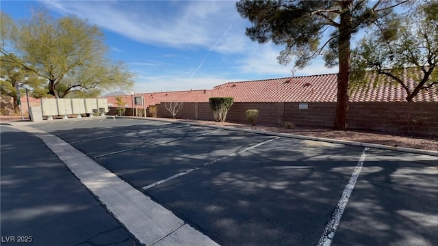 view of road featuring curbs