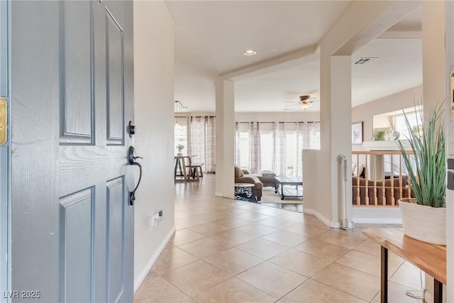 entryway with light tile patterned floors, visible vents, baseboards, ceiling fan, and recessed lighting