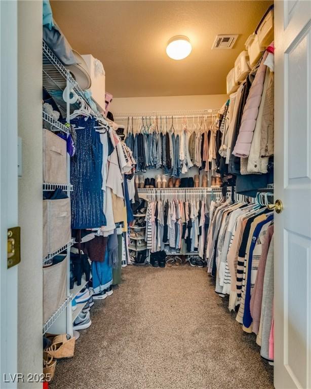 walk in closet featuring visible vents