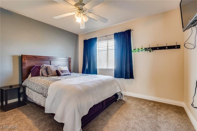 bedroom featuring carpet flooring, a ceiling fan, and baseboards