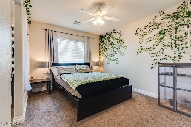 bedroom featuring carpet floors, visible vents, ceiling fan, and baseboards