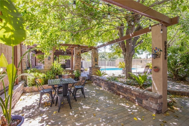 view of patio / terrace with a fenced backyard, a pergola, a fenced in pool, and outdoor dining space