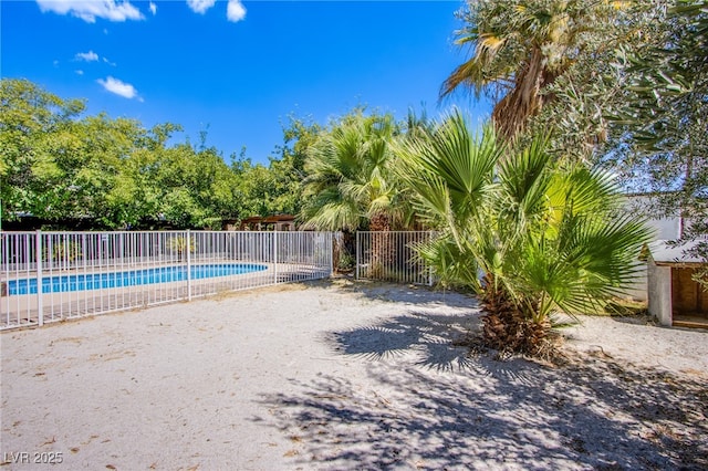 view of pool featuring fence and a fenced in pool