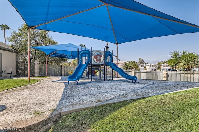 community playground featuring fence