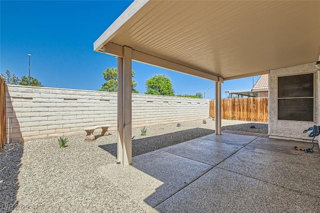 view of patio / terrace with a fenced backyard