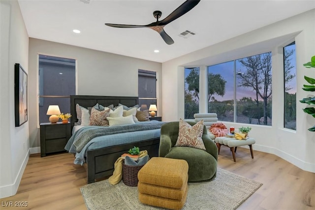 bedroom with light wood-style floors, recessed lighting, and visible vents