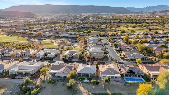 drone / aerial view with a residential view and a mountain view