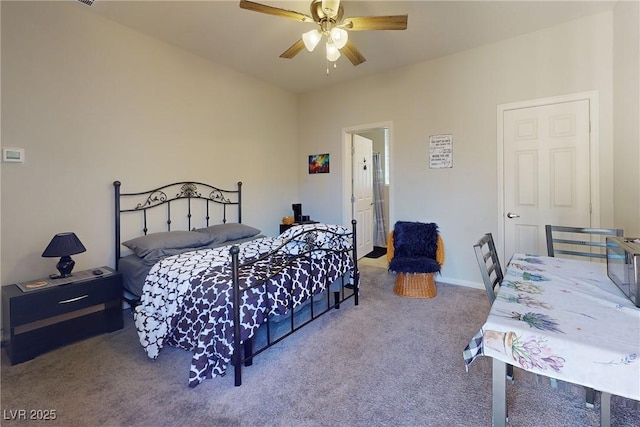 carpeted bedroom featuring a ceiling fan and baseboards