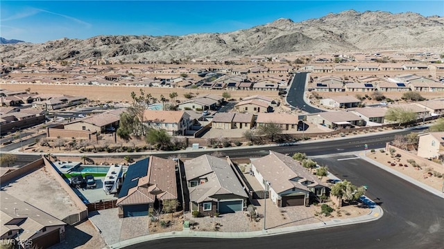 bird's eye view featuring a residential view and a mountain view