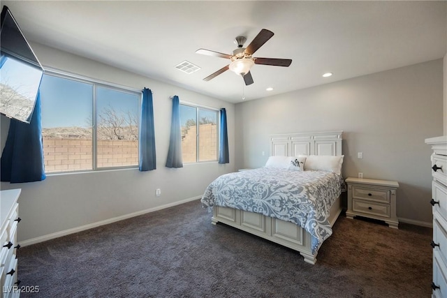 bedroom with baseboards, visible vents, and dark carpet