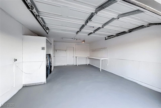 garage with independent washer and dryer