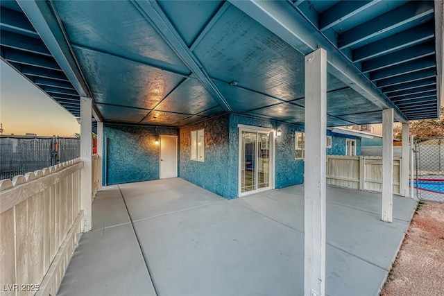 view of patio / terrace featuring fence