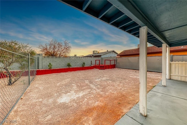 exterior space featuring a fenced backyard