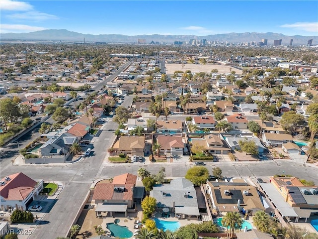 birds eye view of property featuring a residential view and a mountain view