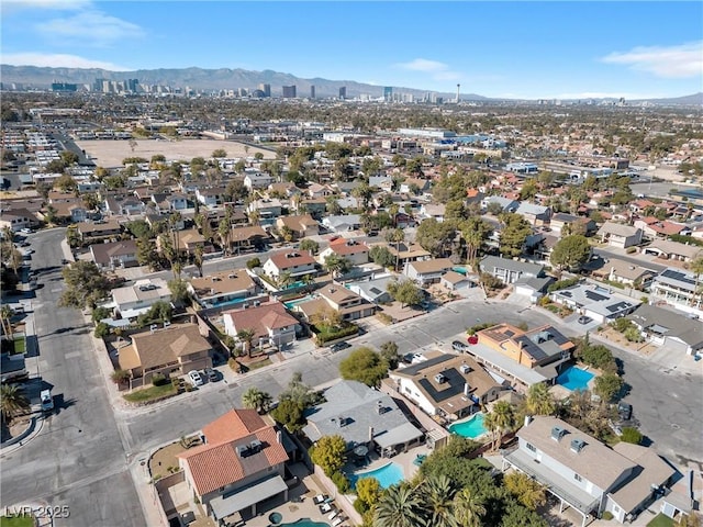 bird's eye view featuring a view of city, a mountain view, and a residential view