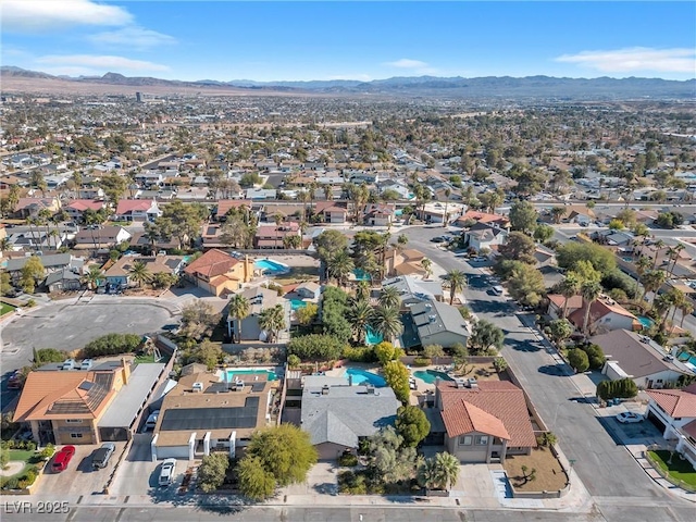 bird's eye view with a residential view and a mountain view