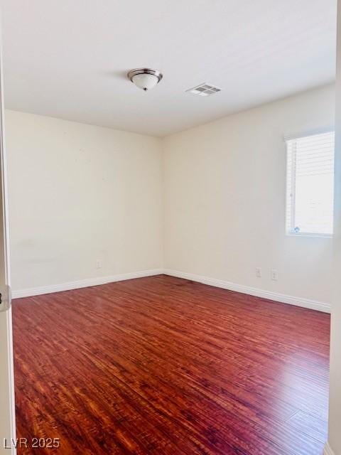 4562 White Cap Mill St, Las Vegas, NV 89147 - unfurnished room featuring wood finished floors and baseboards
