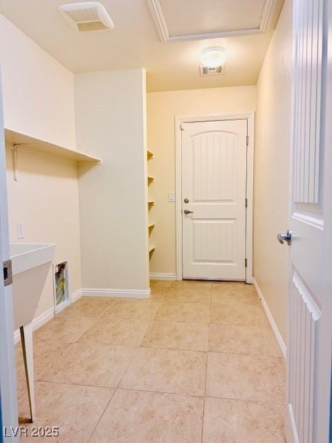 4562 White Cap Mill St, Las Vegas, NV 89147 - laundry room featuring light tile patterned flooring, hookup for a washing machine, and baseboards