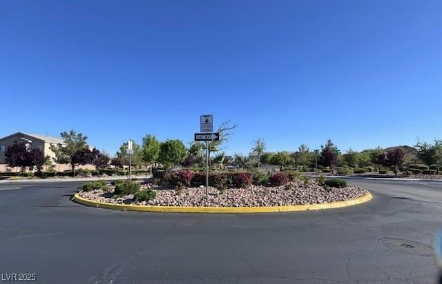 4562 White Cap Mill St, Las Vegas, NV 89147 - view of asphalt road with curbs