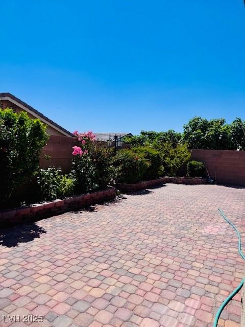 4562 White Cap Mill St, Las Vegas, NV 89147 - view of patio / terrace featuring a fenced backyard