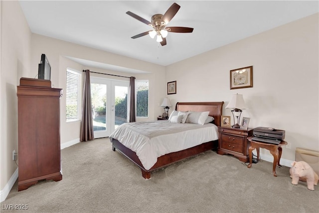 bedroom featuring baseboards, french doors, light colored carpet, and access to exterior