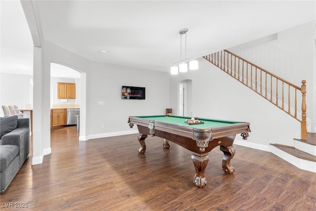 rec room featuring arched walkways, dark wood-style flooring, billiards, and baseboards