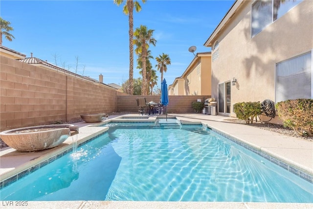 view of swimming pool featuring a fenced in pool, a patio area, and a fenced backyard