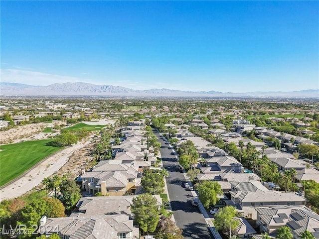 drone / aerial view featuring a residential view and a mountain view