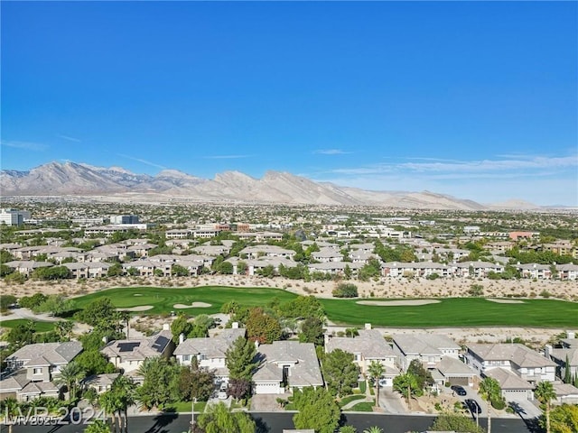 aerial view with a mountain view and golf course view