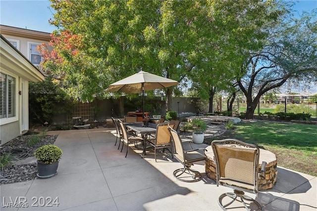 view of patio / terrace with a fenced backyard and outdoor dining area