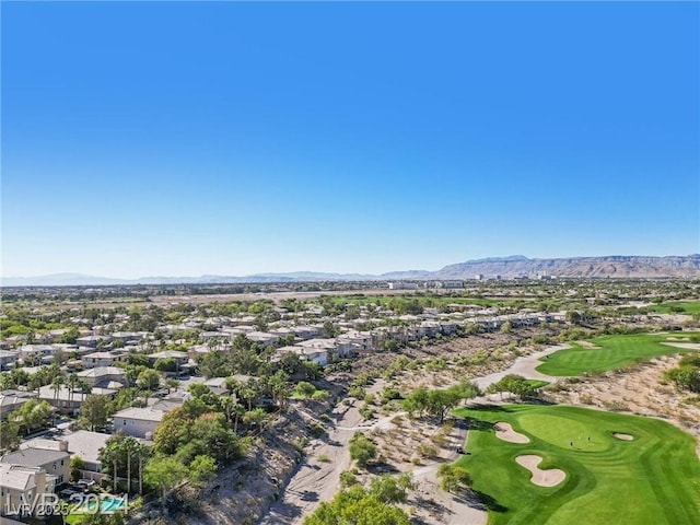 aerial view featuring a residential view, a mountain view, and golf course view