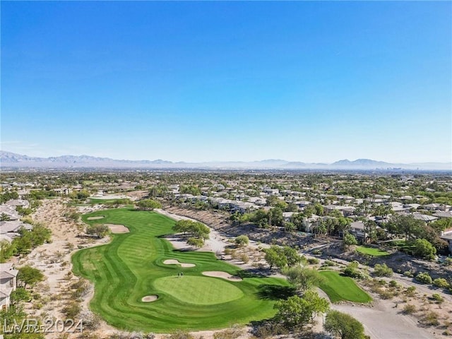aerial view featuring a mountain view and golf course view