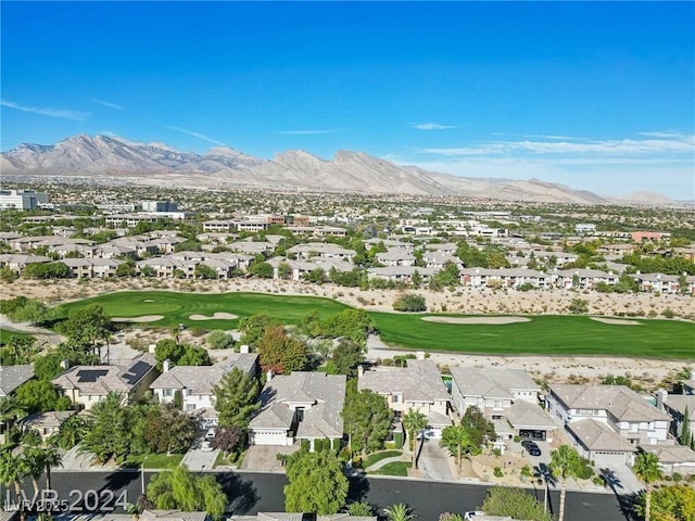 bird's eye view with a residential view, a mountain view, and golf course view