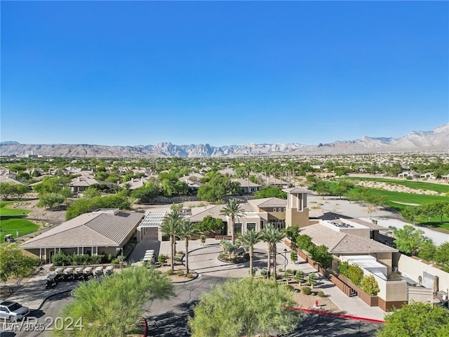 drone / aerial view with a residential view and a mountain view