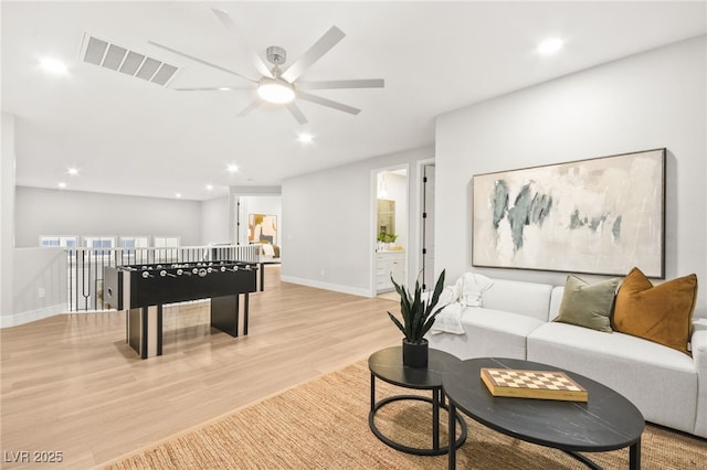 game room with recessed lighting, baseboards, visible vents, and light wood finished floors