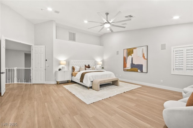 bedroom featuring recessed lighting, visible vents, light wood-style flooring, and baseboards