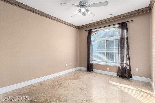 unfurnished room with ornamental molding, a wealth of natural light, ceiling fan, and baseboards