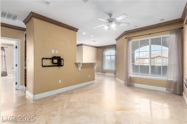 empty room with ceiling fan, ornamental molding, visible vents, and baseboards