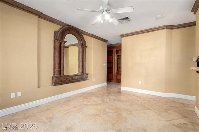 unfurnished room featuring baseboards, a ceiling fan, visible vents, and crown molding