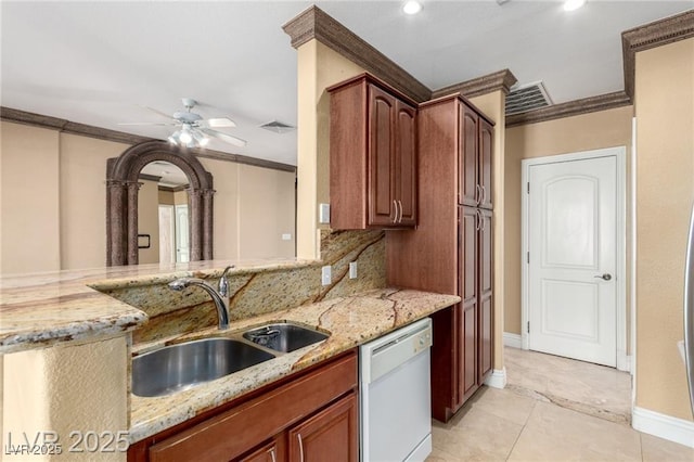 kitchen with light stone counters, a ceiling fan, visible vents, dishwasher, and crown molding