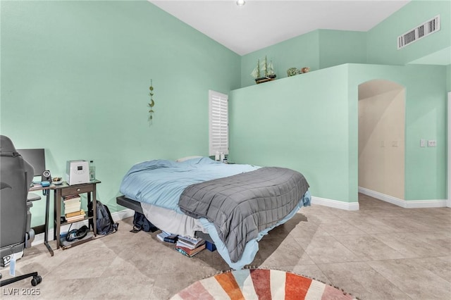 tiled bedroom featuring visible vents and baseboards