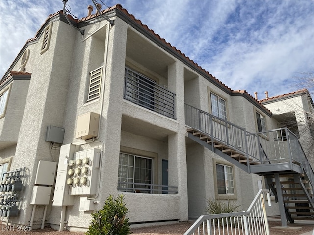 view of building exterior featuring stairs