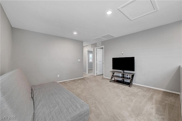 interior space with recessed lighting, light carpet, visible vents, baseboards, and attic access