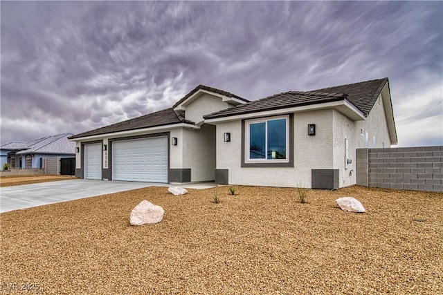 single story home with fence, a garage, driveway, and stucco siding