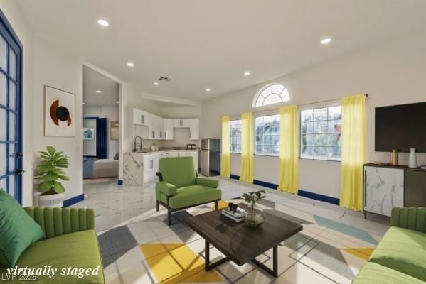 living room featuring recessed lighting