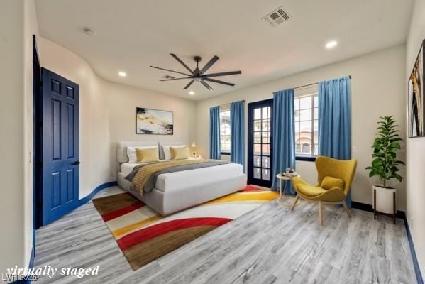 bedroom with light wood-type flooring, baseboards, visible vents, and recessed lighting