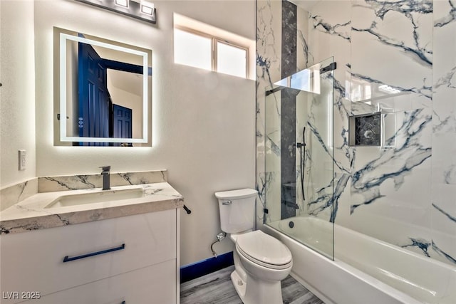 full bath featuring shower / washtub combination, vanity, and toilet