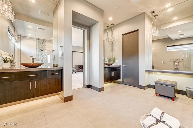 full bathroom with recessed lighting, baseboards, visible vents, and vanity